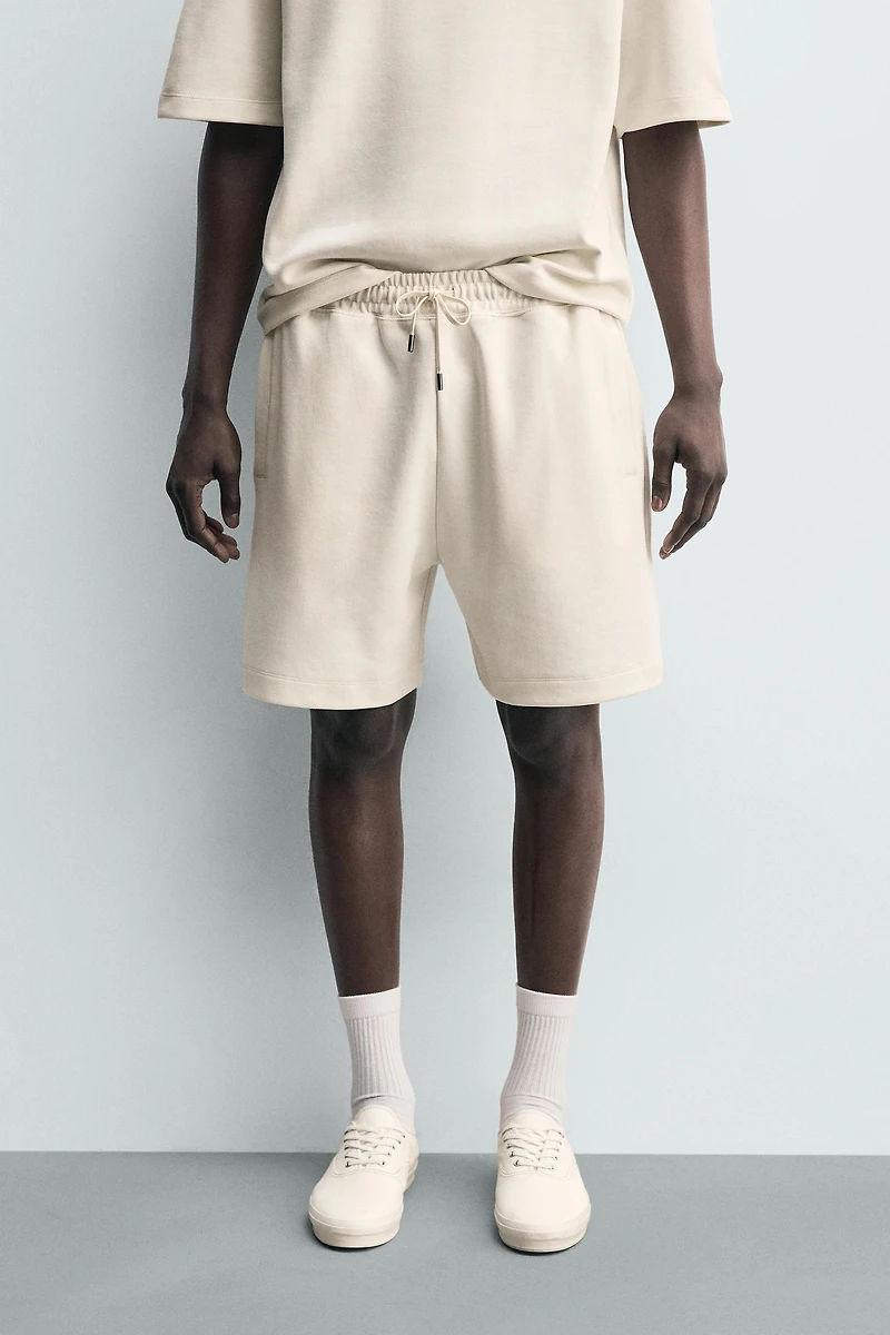 BERMUDA JOGGER RELAXED FIT INTERLOCK