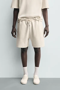 BERMUDA JOGGER RELAXED FIT INTERLOCK
