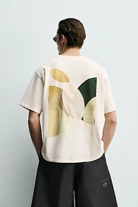 T-SHIRT À INSCRIPTION ET PIÈCES