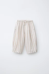 PANTALON BALLON À PLIS ET RAYURES