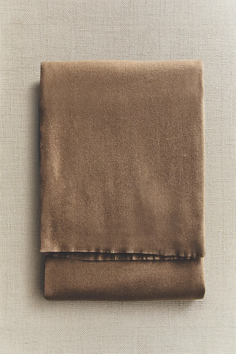 DECORATIVE FRINGED BLANKET