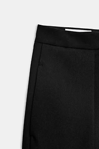 HIGH-WAISTED PLEATED PANTS