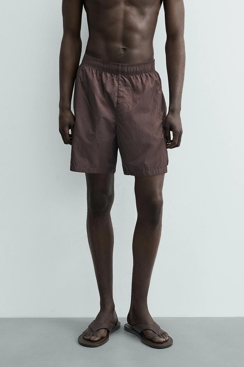 LONG CARGO SWIM TRUNKS