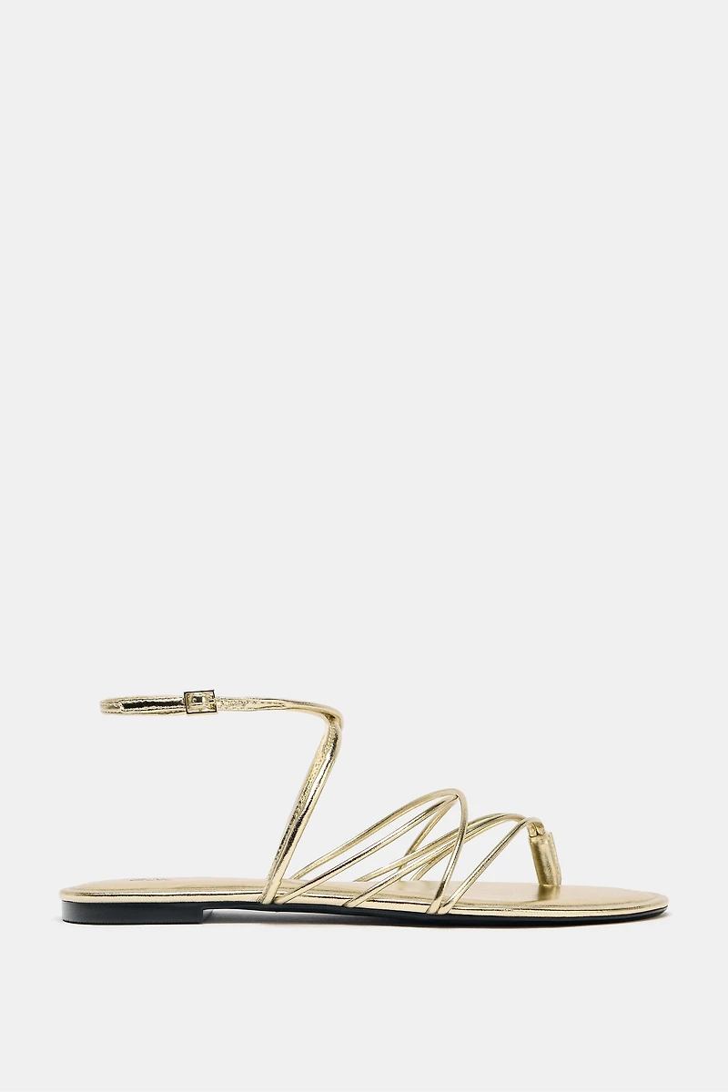 GOLD STRAPPY FLAT SANDALS