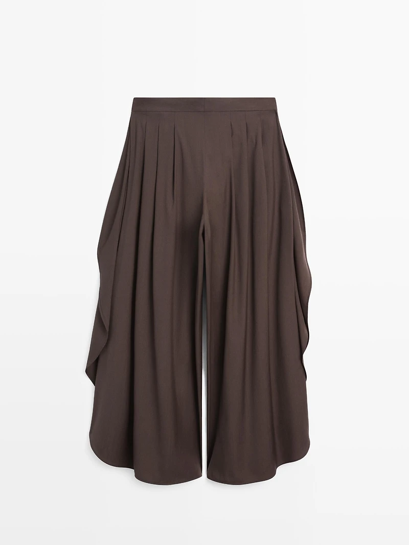 Pantalon large plissé à fentes latérales