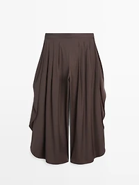 Pantalon large plissé à fentes latérales