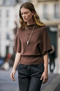 BELTED CAPE KNIT TOP