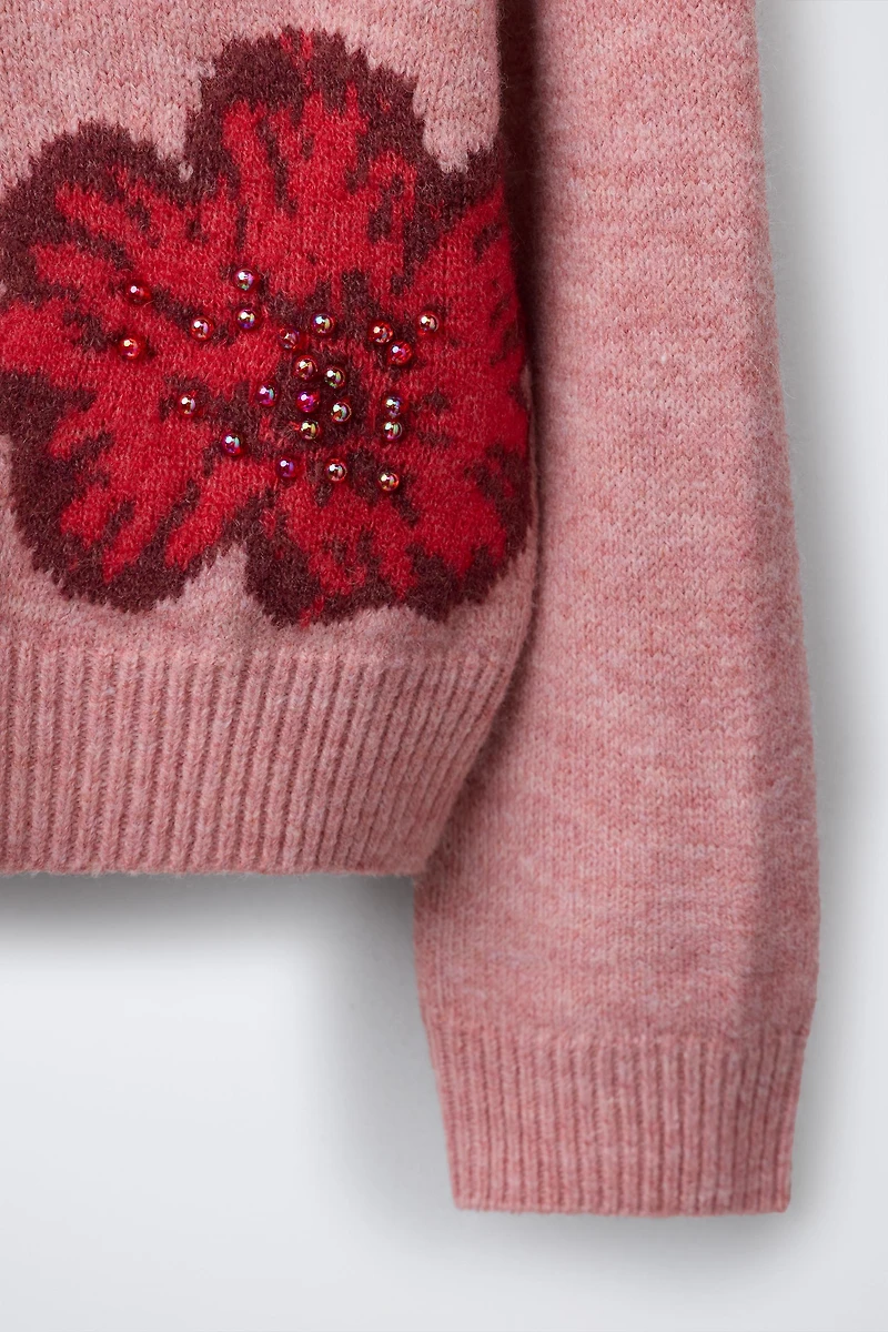 PULL EN MAILLE À FLEURS ET FANTAISIE