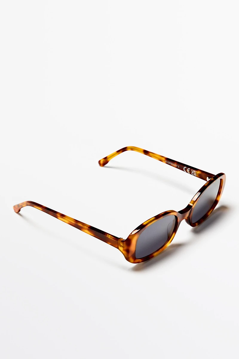 Oval tortoiseshell-effect sunglasses