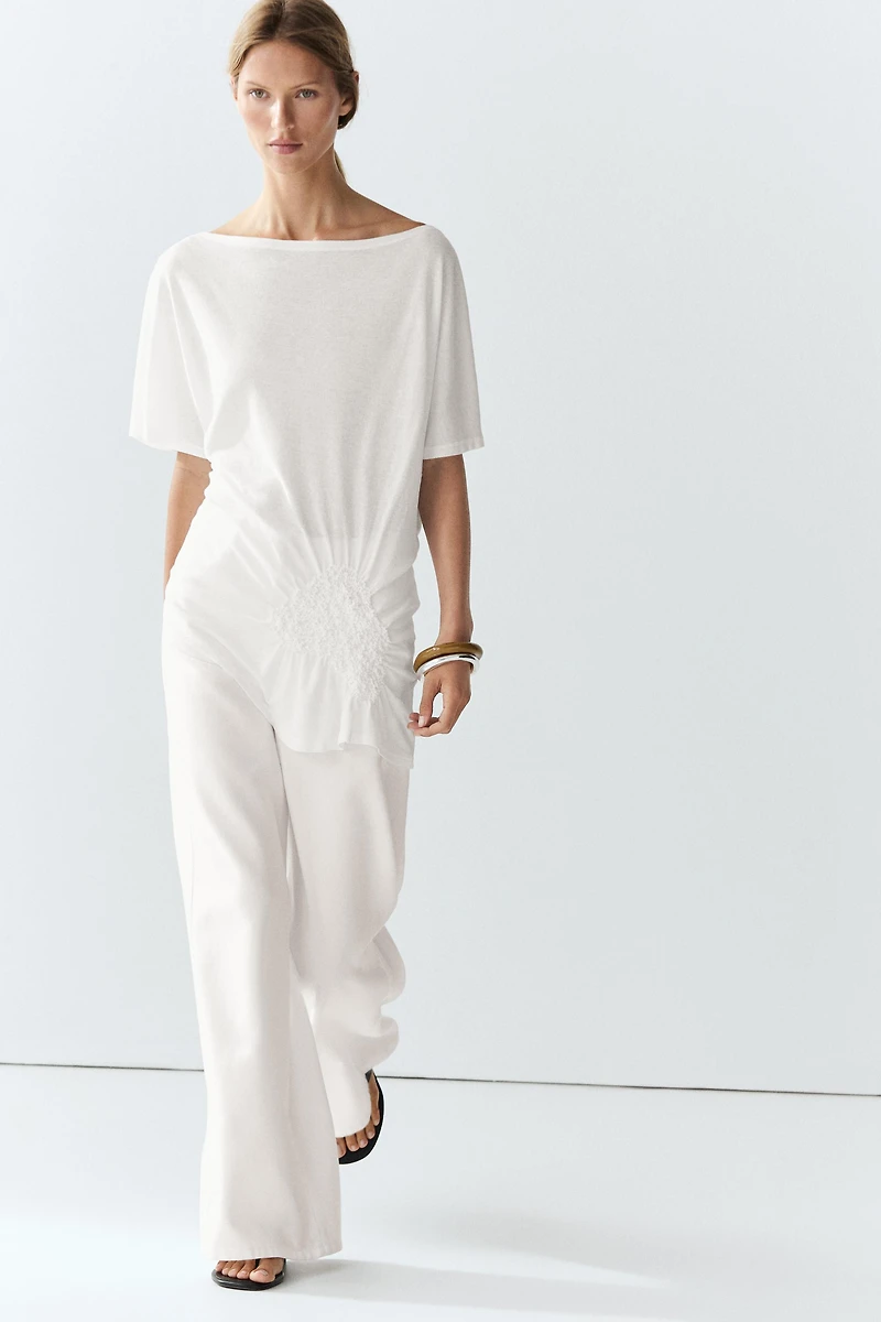 Asymmetric top with embroidered detail