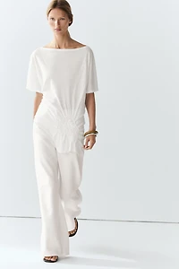 Asymmetric top with embroidered detail