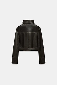 BLOUSON EN CUIR 100% USÉ