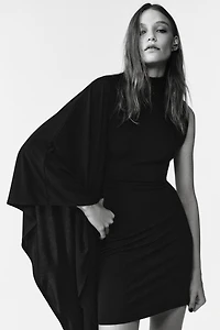 ASYMMETRIC SLEEVE DRESS LIMITED EDITION