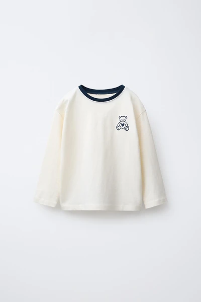 T-SHIRT VARSITY OURS BRODÉ