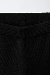 FLARED KNIT PANTS WITH BOWS AND RUFFLE