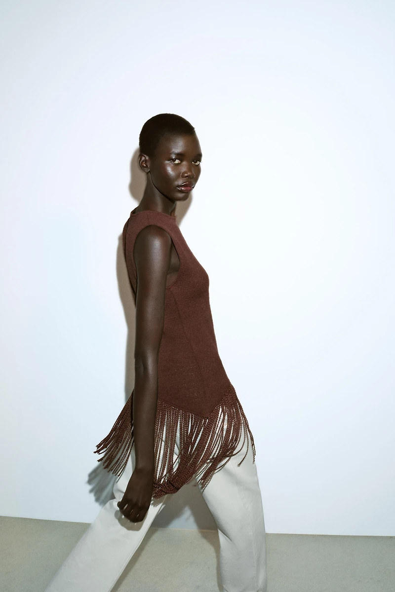 ASYMMETRIC STRUCTURE TOP