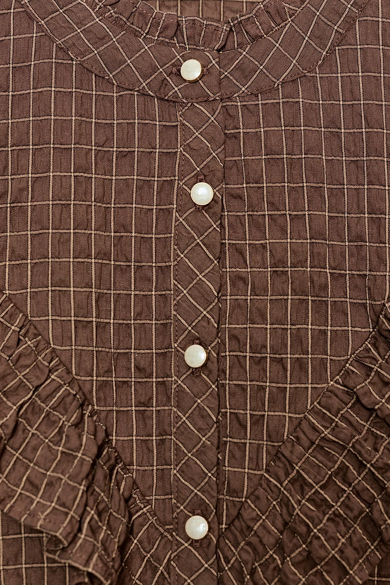 BLOUSE À CARREAUX ET VOLANTS