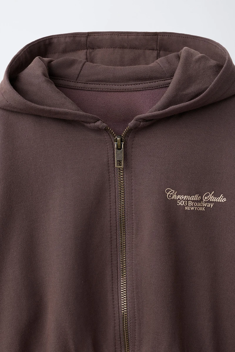 RAISED TEXT HOODIE