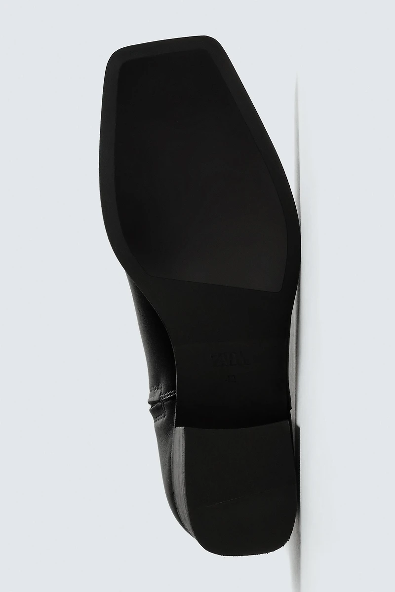 HEELED LEATHER BOOTS