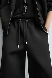 WIDE FIT NEOPRENE EFFECT PANTS
