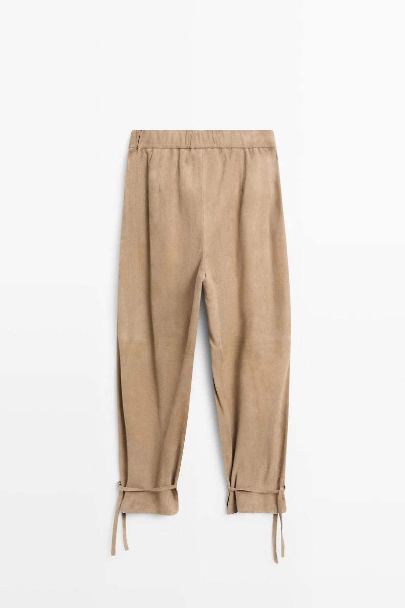 Suede leather pants with tie-detail hems