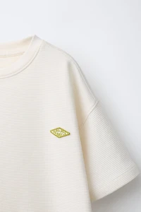 T-SHIRT OTTOMAN AVEC PIÈCE