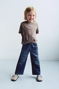 FLUID RIPPED WIDE LEG JEANS
