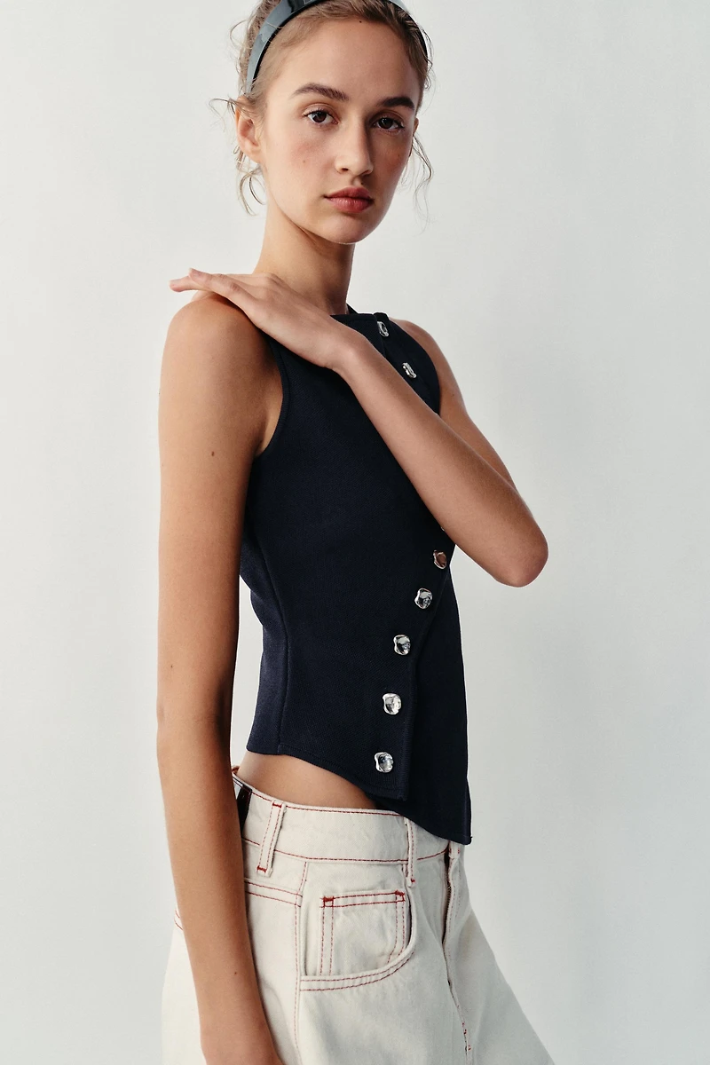 TOP EN MAILLE À FERMETURE ASYMÉTRIQUE