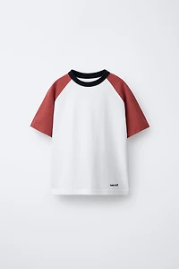 EMBROIDERED TEXT RAGLAN SLEEVE T-SHIRT