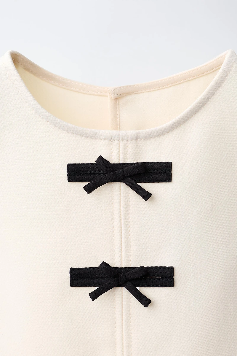 BOW APPLIQUÉ TOP