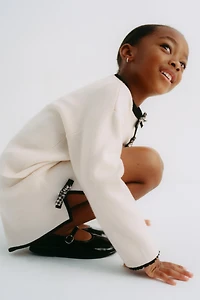 CONTRAST BOW KNIT SKIRT