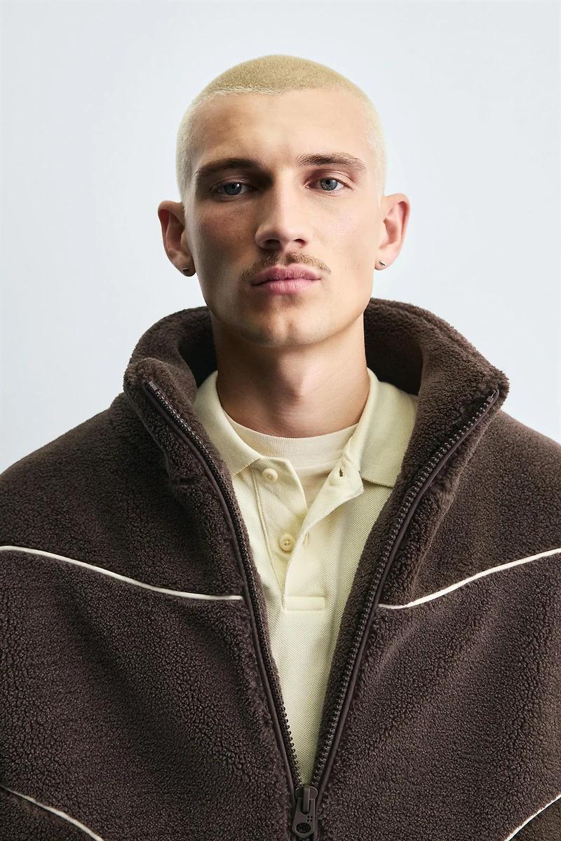 BLOUSON EFFET MOUTON À LISERÉS EN CONTRASTE