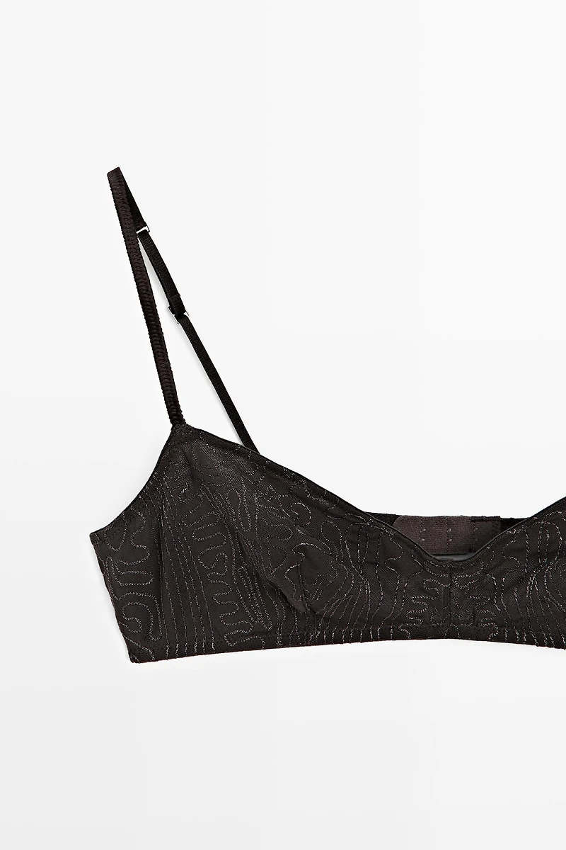 Top with embroidered detail