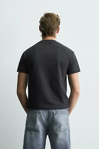 T-SHIRT COURT FIT À INSCRIPTION DÉLAVÉ