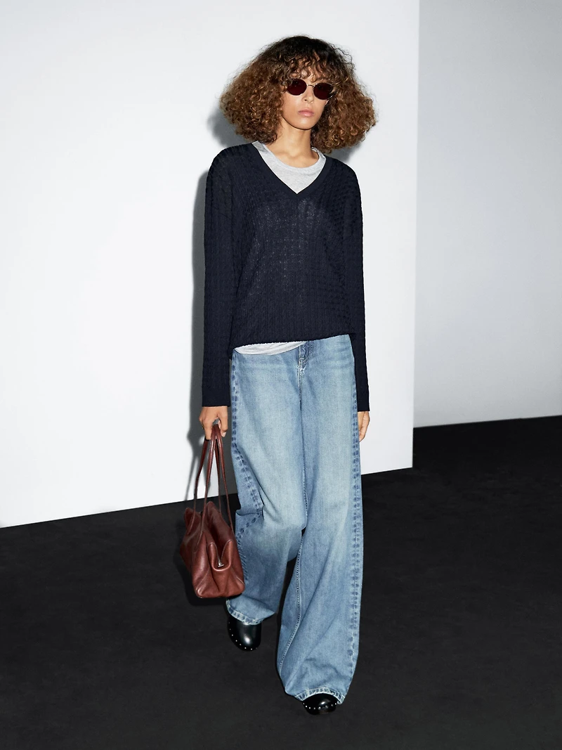 V-neck cable-knit sweater