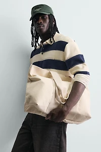 IRREGULAR STRIPED KNIT POLO SHIRT