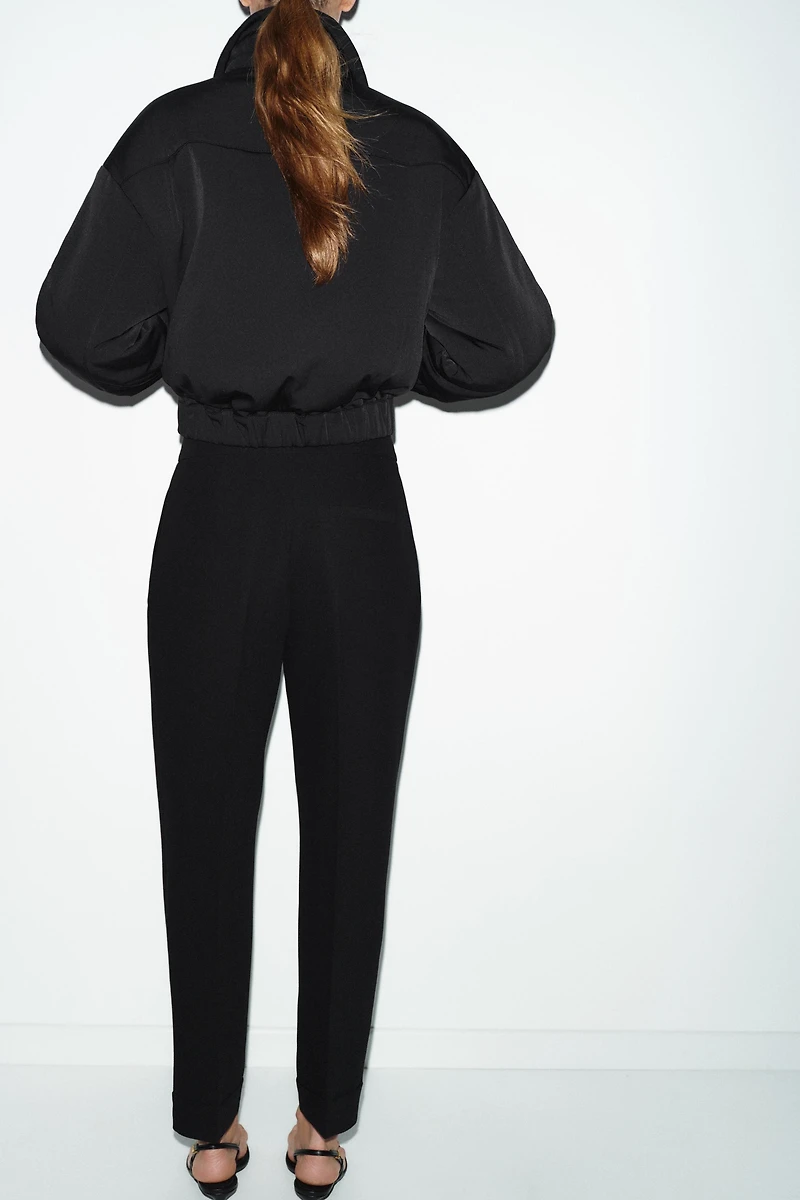 PLEATED PANTS WITH CUFFED HEM