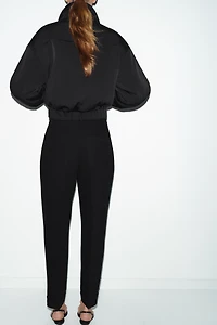 PLEATED PANTS WITH CUFFED HEM