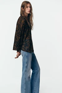 BLOUSE SEMI-TRANSPARENTE À IMPRIMÉ ANIMALIER