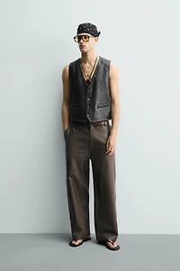 GILET EN CUIR COUTURES CONTRASTANTES