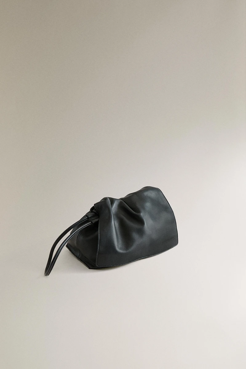 LEATHER POUCH MAKEUP BAG
