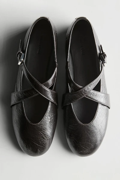 Ballet flats with criss-cross straps and buckle