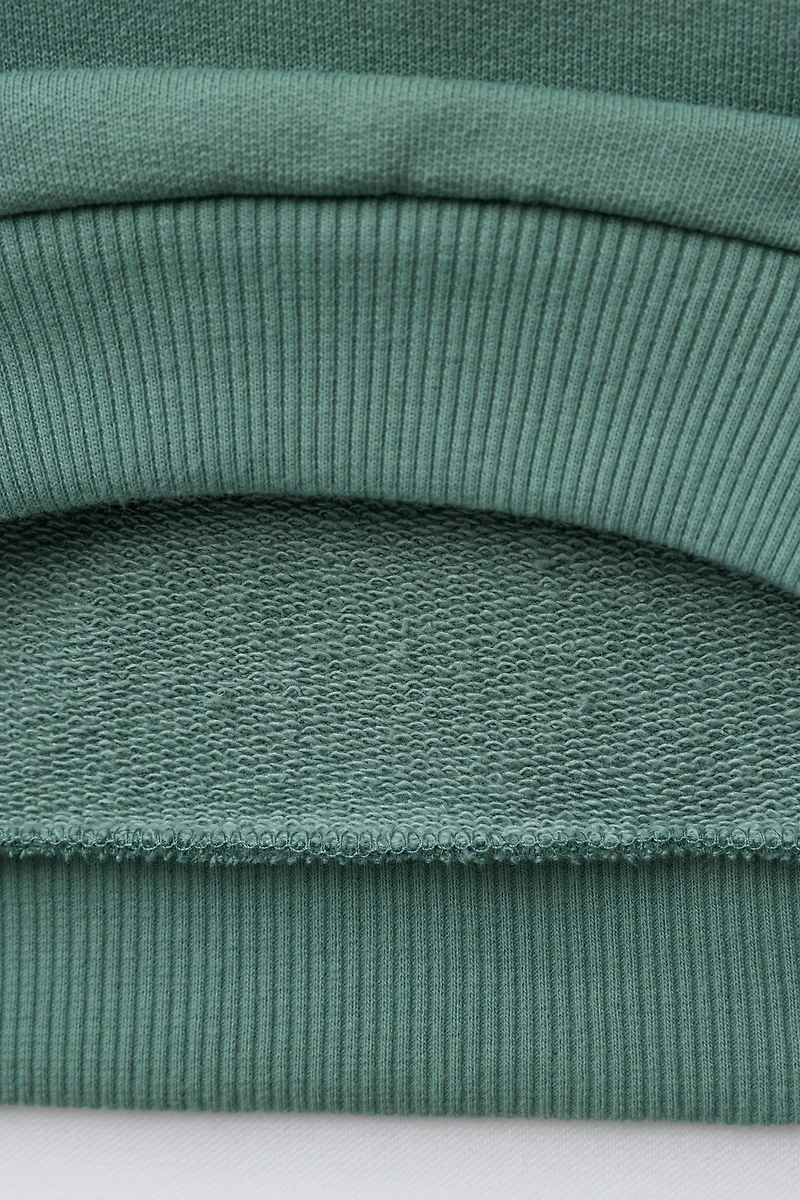 TERRY PATCH SWEATSHIRT