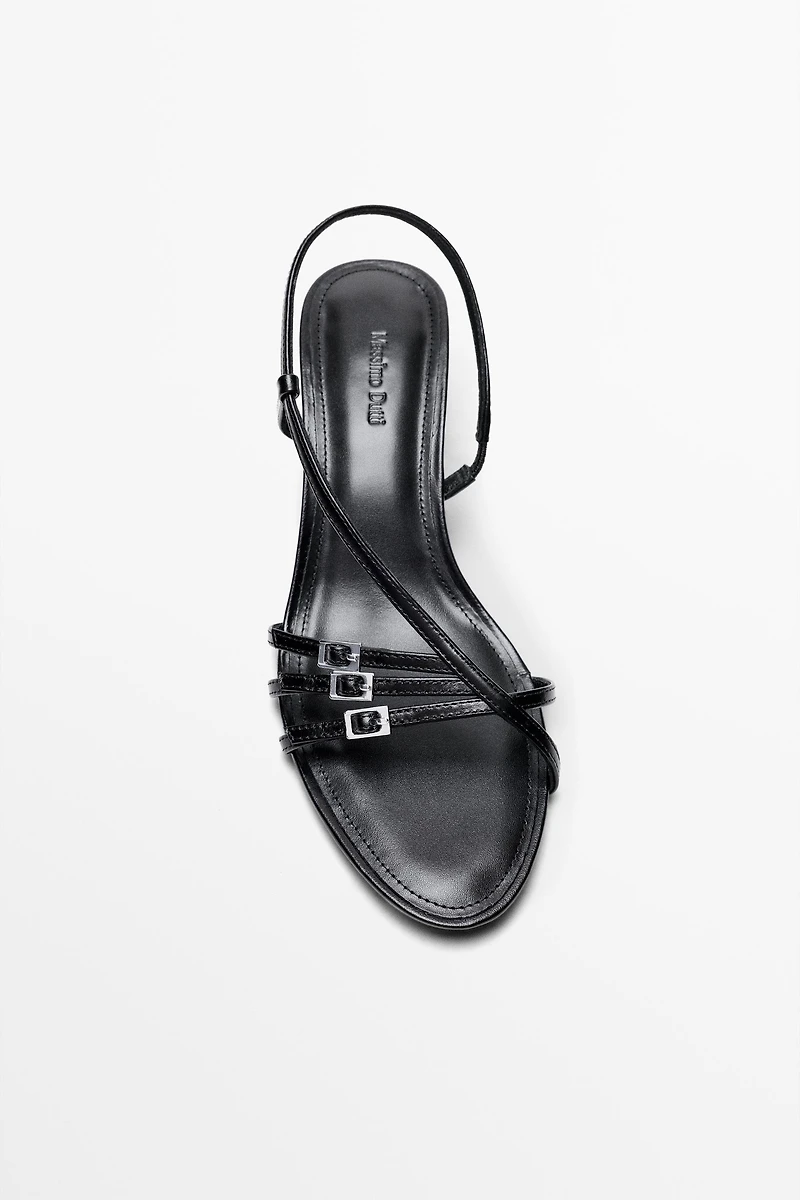 Leather heeled sandals with buckles
