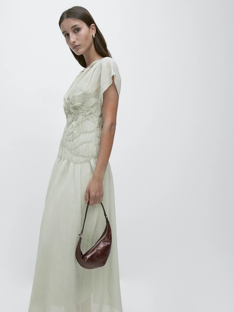 Long flowing dress with embroidered details