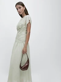 Long flowing dress with embroidered details
