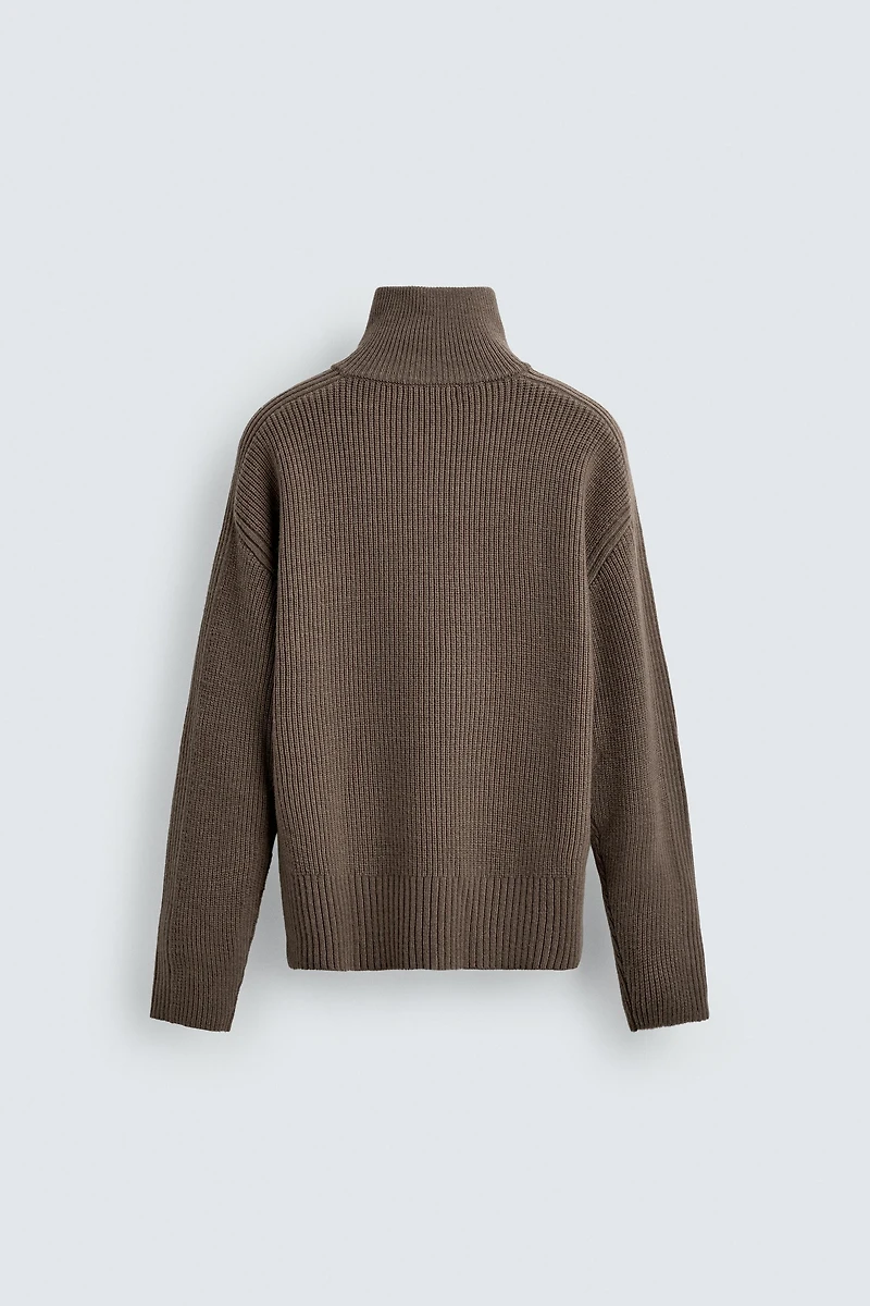 PULL EN MAILLE PERLÉE AVEC COL ZIPPÉ