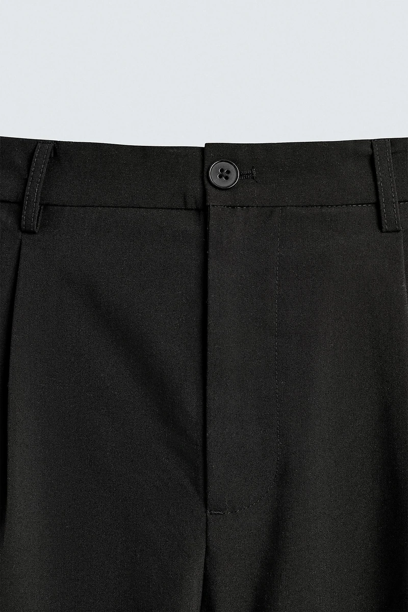 PLEATED WIDE FIT PANTS