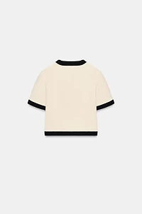 VESTE MANCHES COURTES