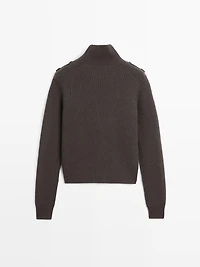 Knit sweater with shoulder detail